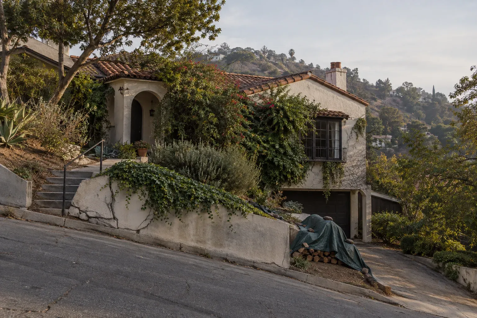 Hillside Mediterranean house with a clay tile roof, typical of the Hollywood Hills