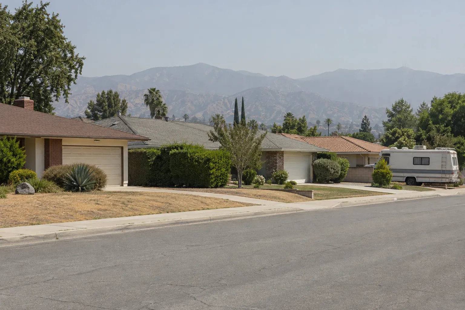 Wide street of 1950s ranch houses, typical of the San Fernando Valley