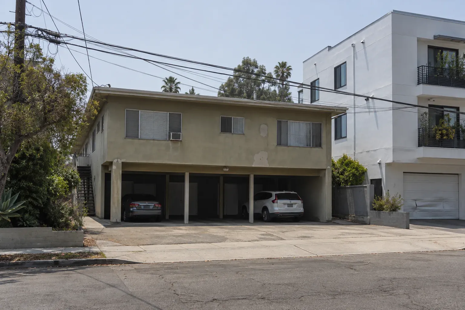 1960s apartment building with a flat roof over carports, typical of West LA
