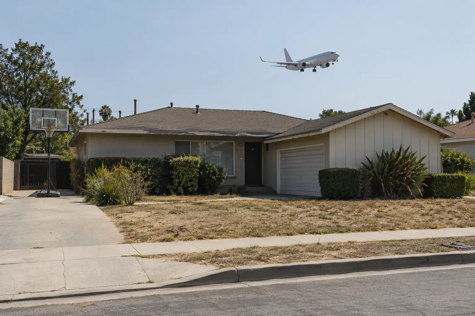 Postwar ranch home under a flight path, typical of Westchester