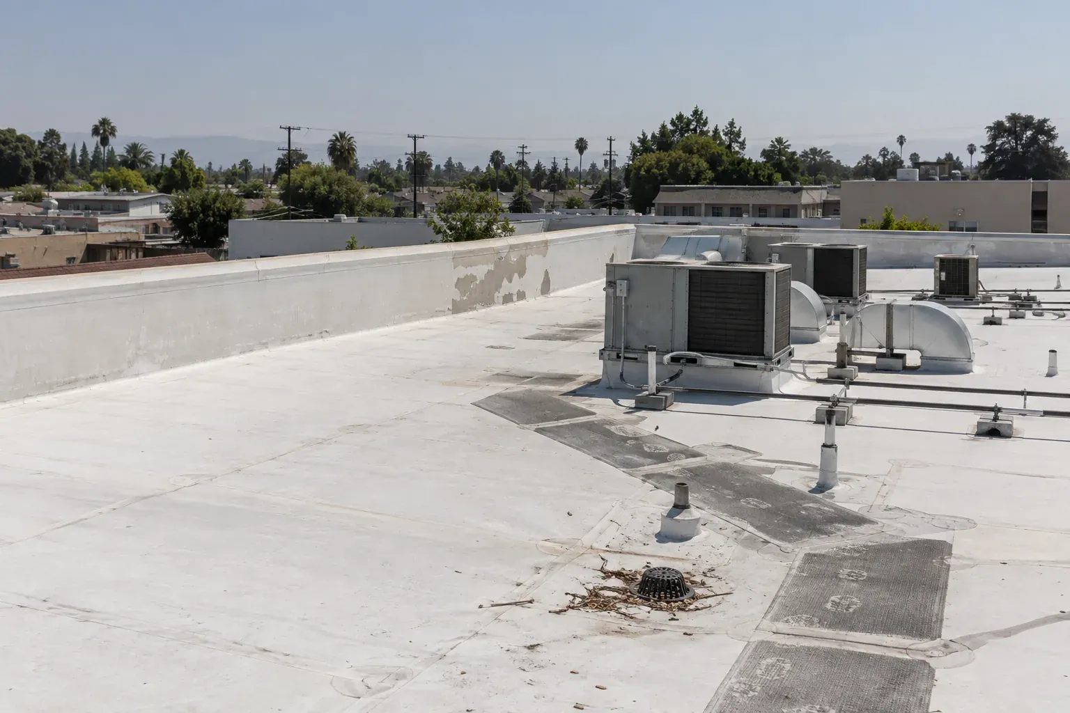 White single-ply roof with HVAC units on a Los Angeles commercial building