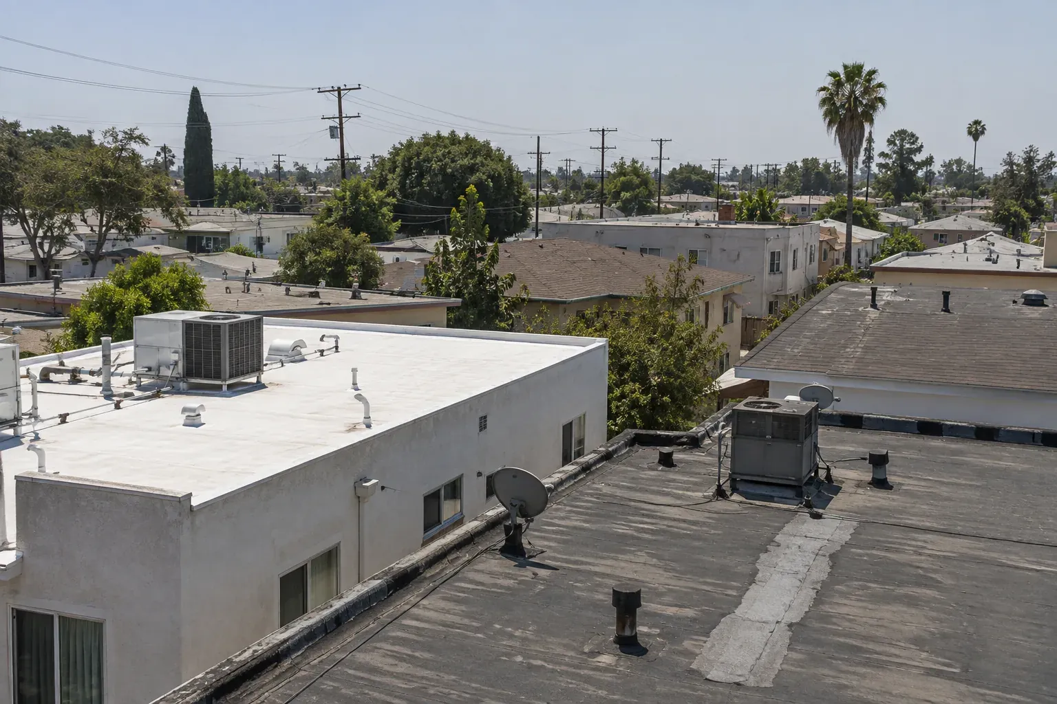 Low-slope apartment roofs of the kind common in Glendale